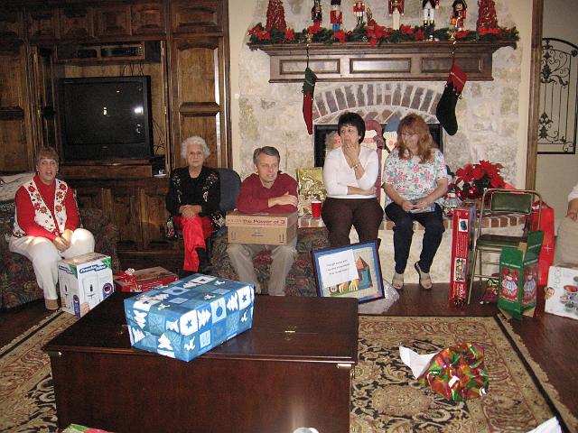 IMG_0124.JPG - Karen, Lydia Mae, Bobby, Mary, and Susan play in the gift exchange.